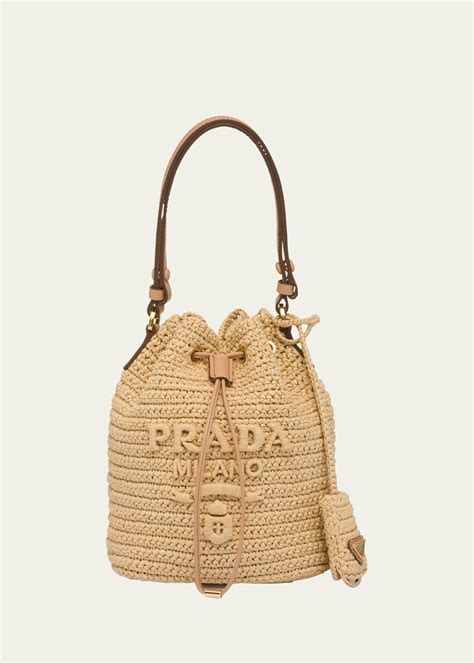 prada raffiabast|Prada raffia bucket bags.